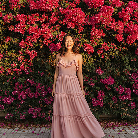 Asian woman in long pink dress before bougainvillea – Summery portrait photography